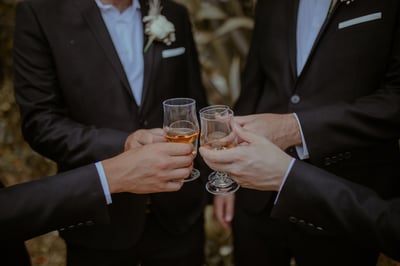 People toasting with drinks